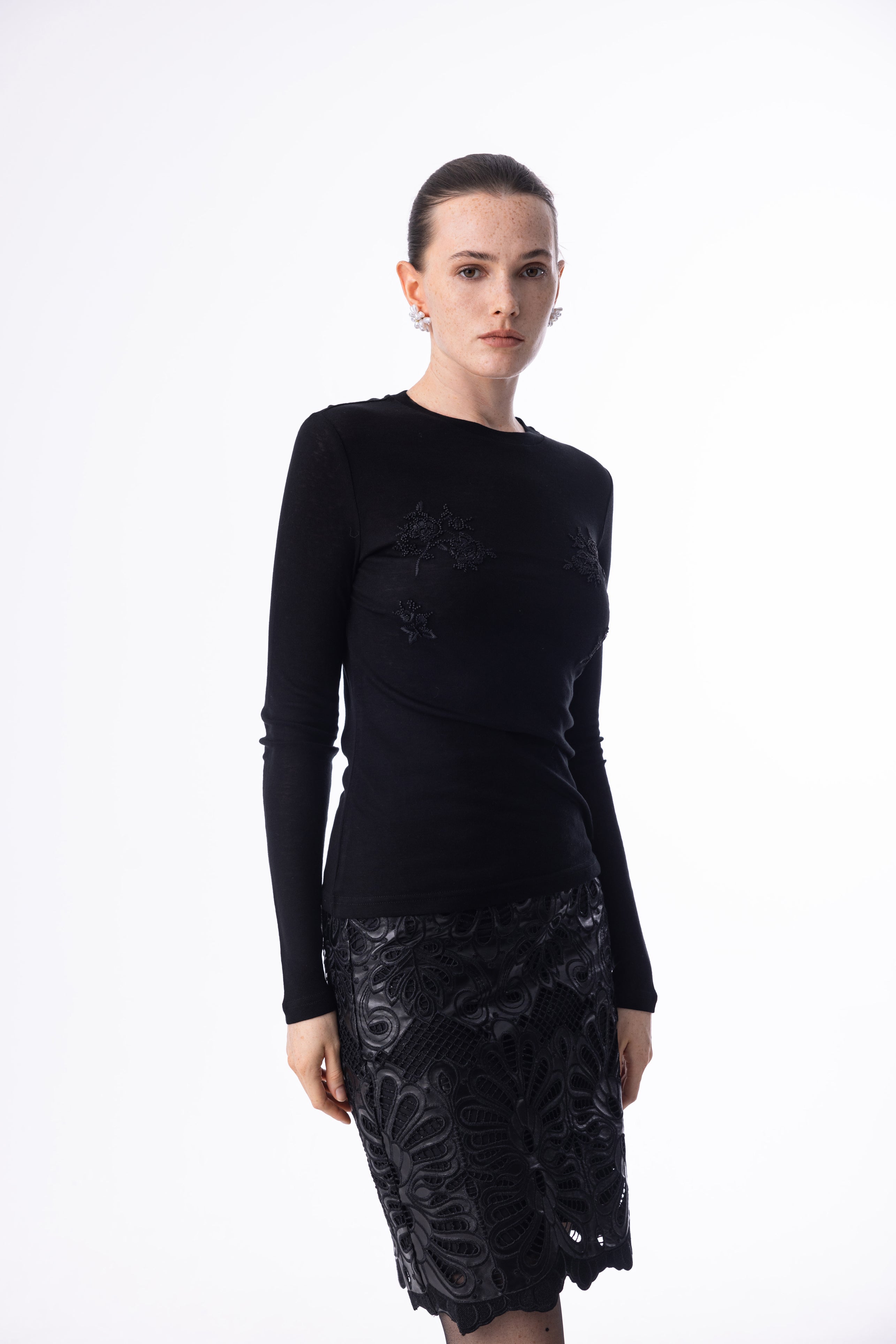 Embroidered faux leather skirt