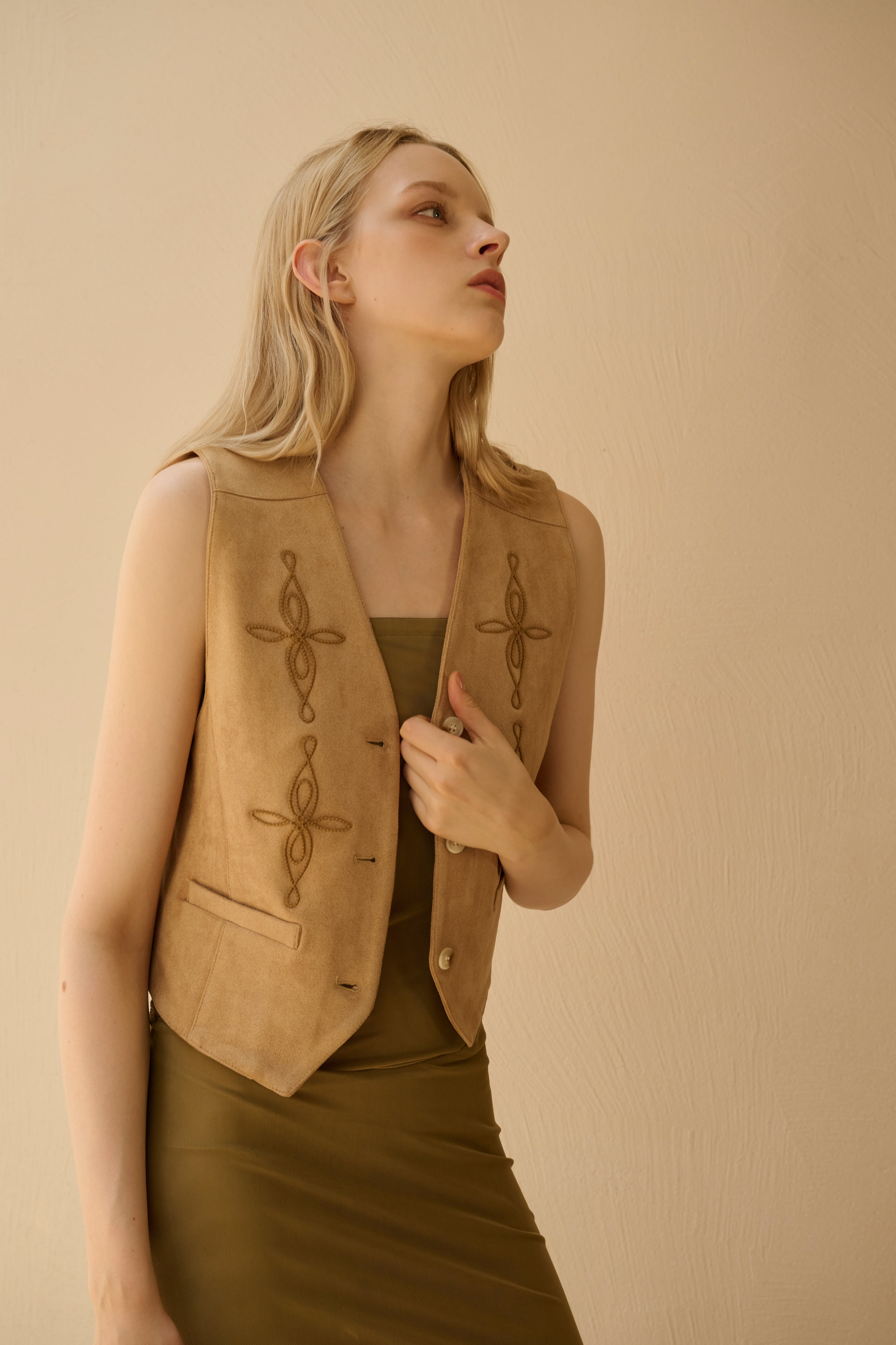 Embroidered faux suede vest