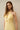Halterneck rosette mini dress