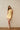 Halterneck rosette mini dress