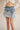 Layered light wash denim skirt