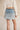 Layered light wash denim skirt