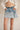Layered light wash denim skirt