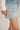 Layered light wash denim skirt