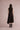 Asymmetrical mock-neck wool dress