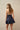 Pleated denim mini skort