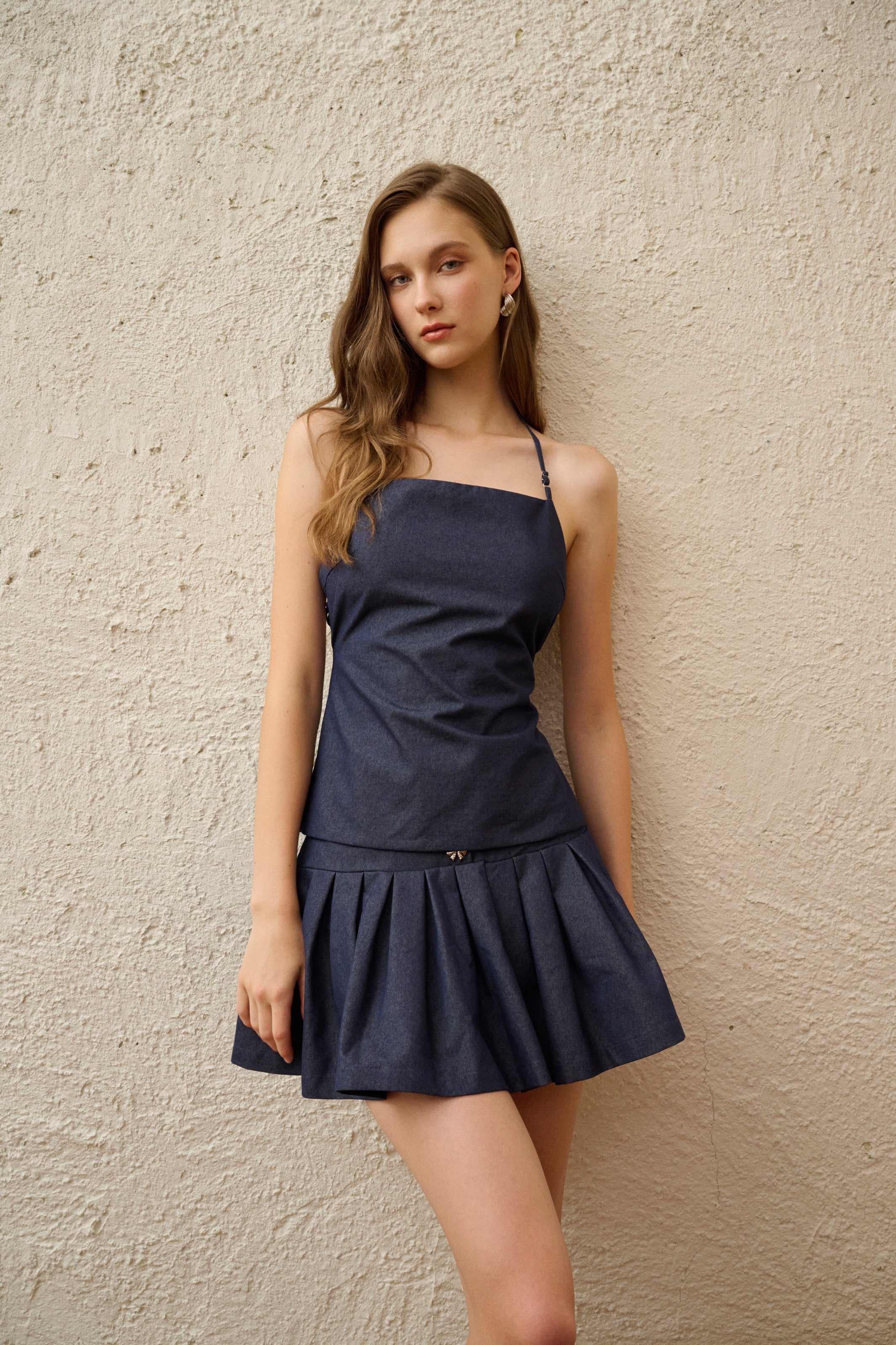 Pleated denim mini skort