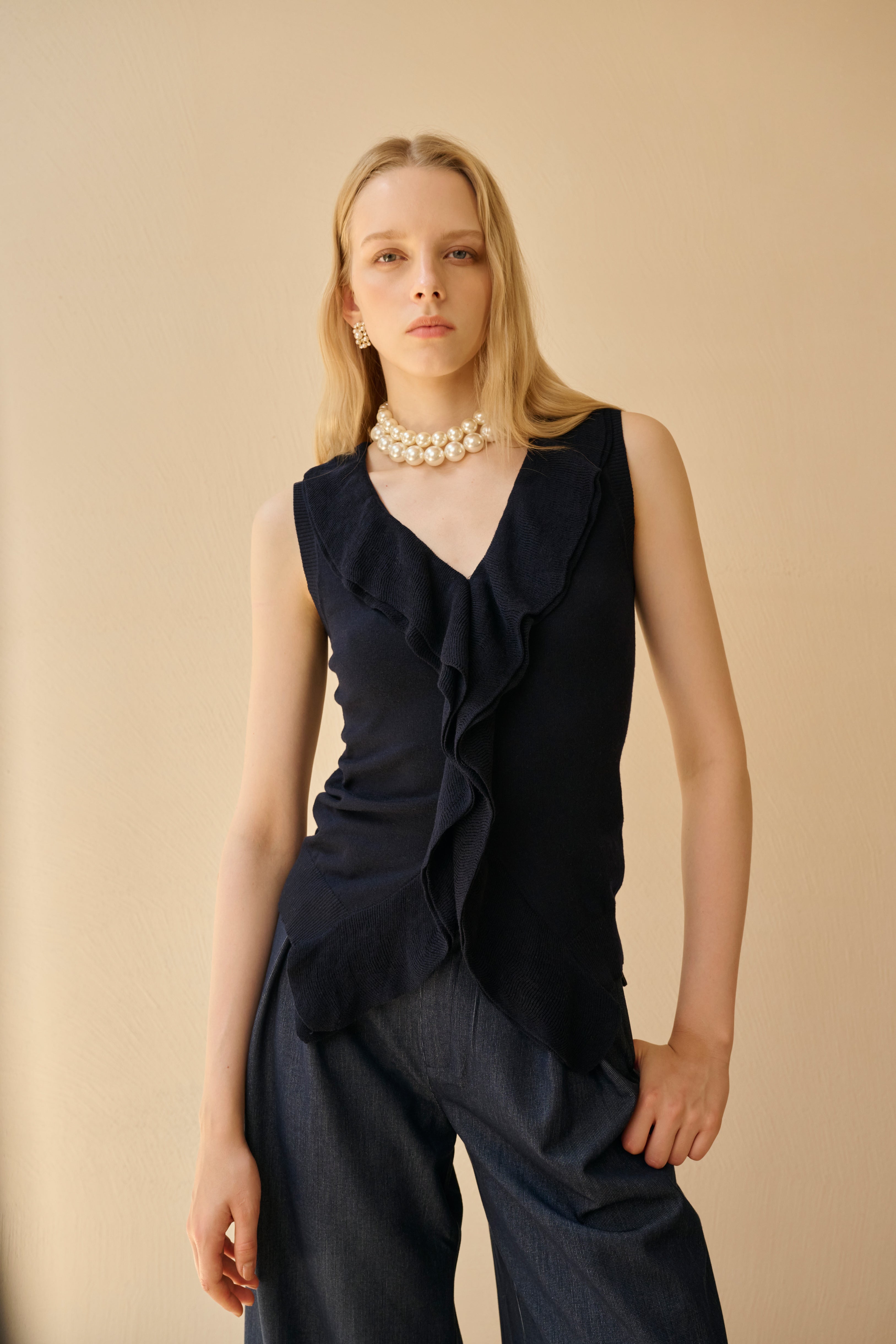 Ruffle V neck sleeveless top