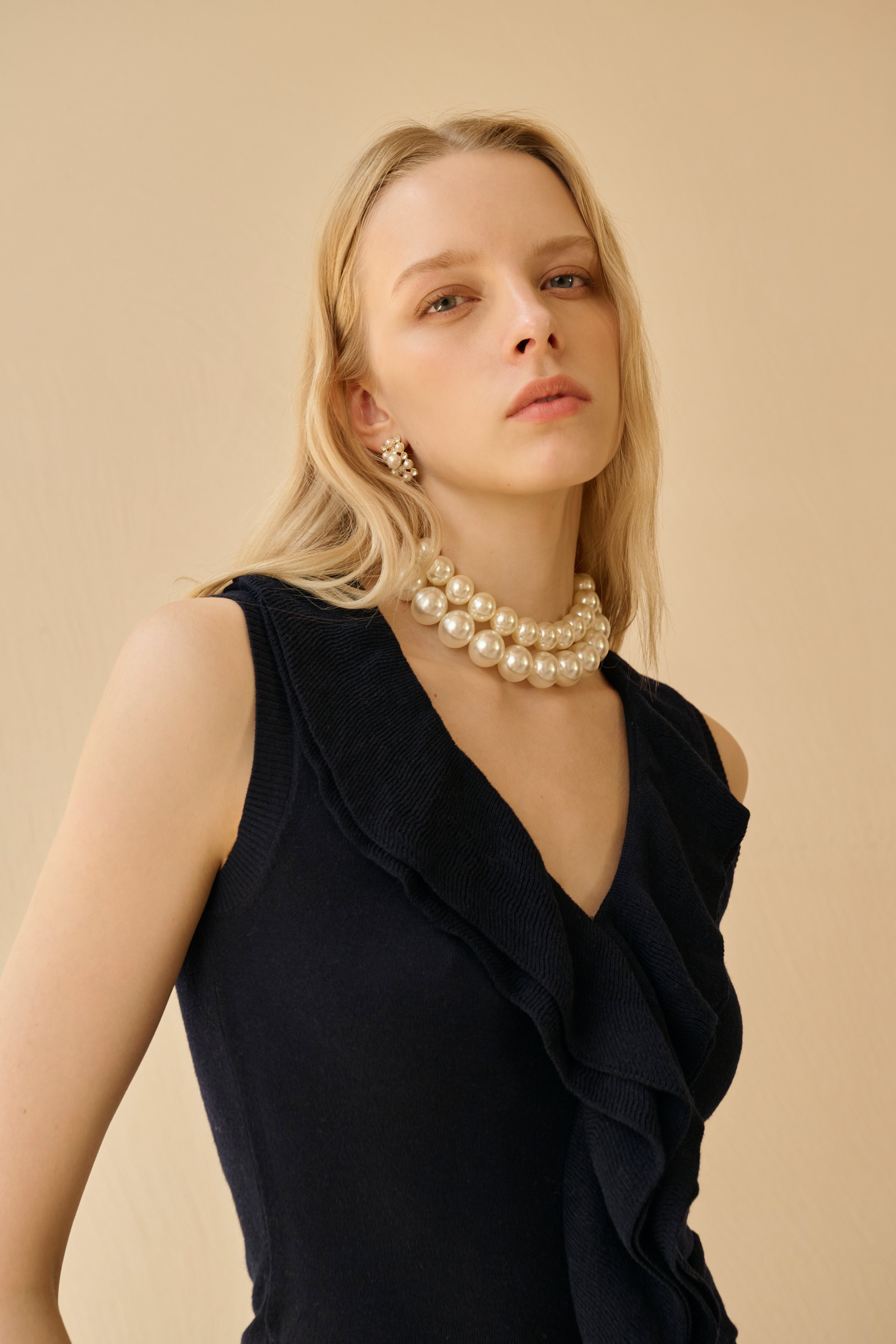 Ruffle V neck sleeveless top