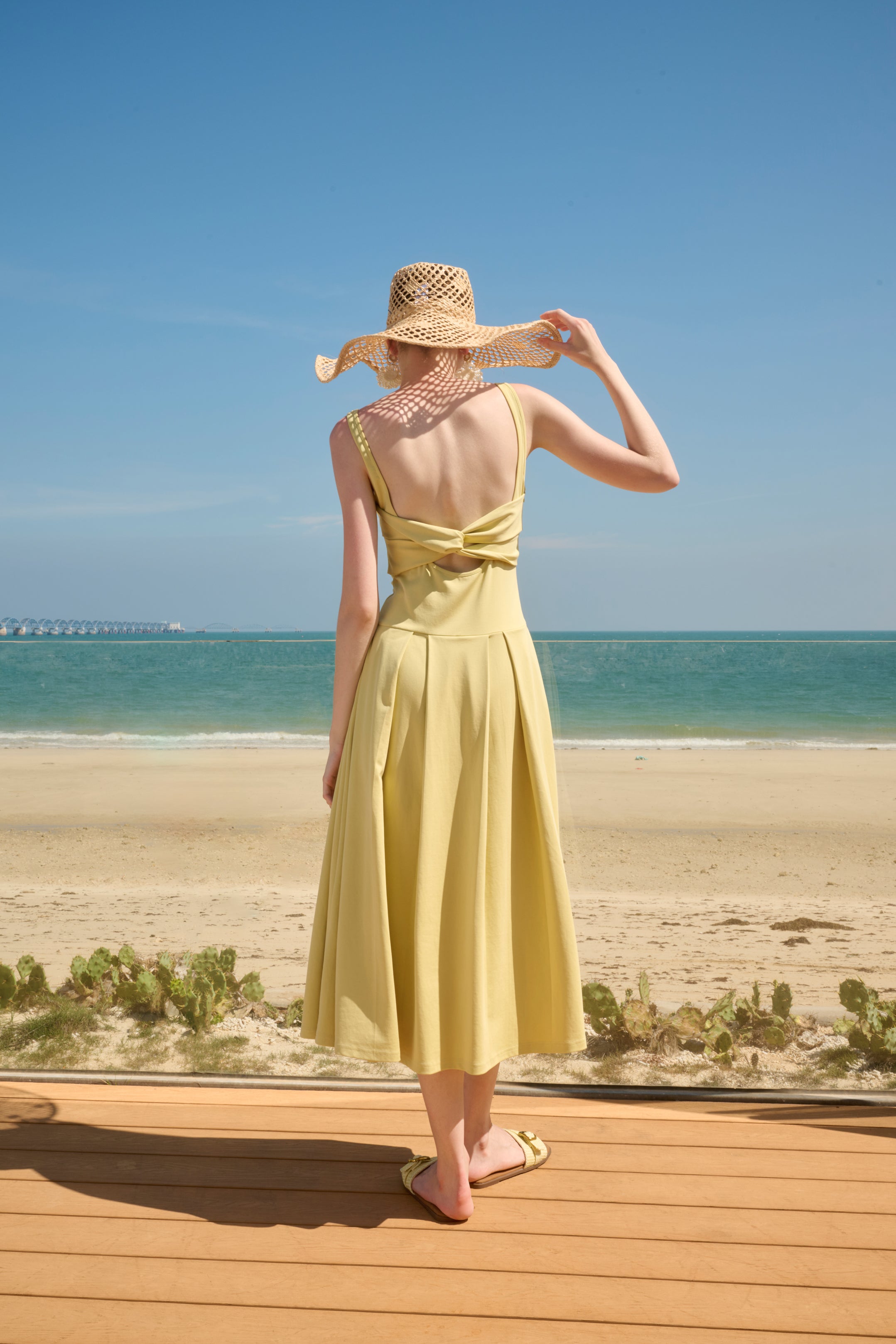 Twisted back midi dress